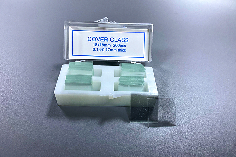 Verre de protection pour microscope